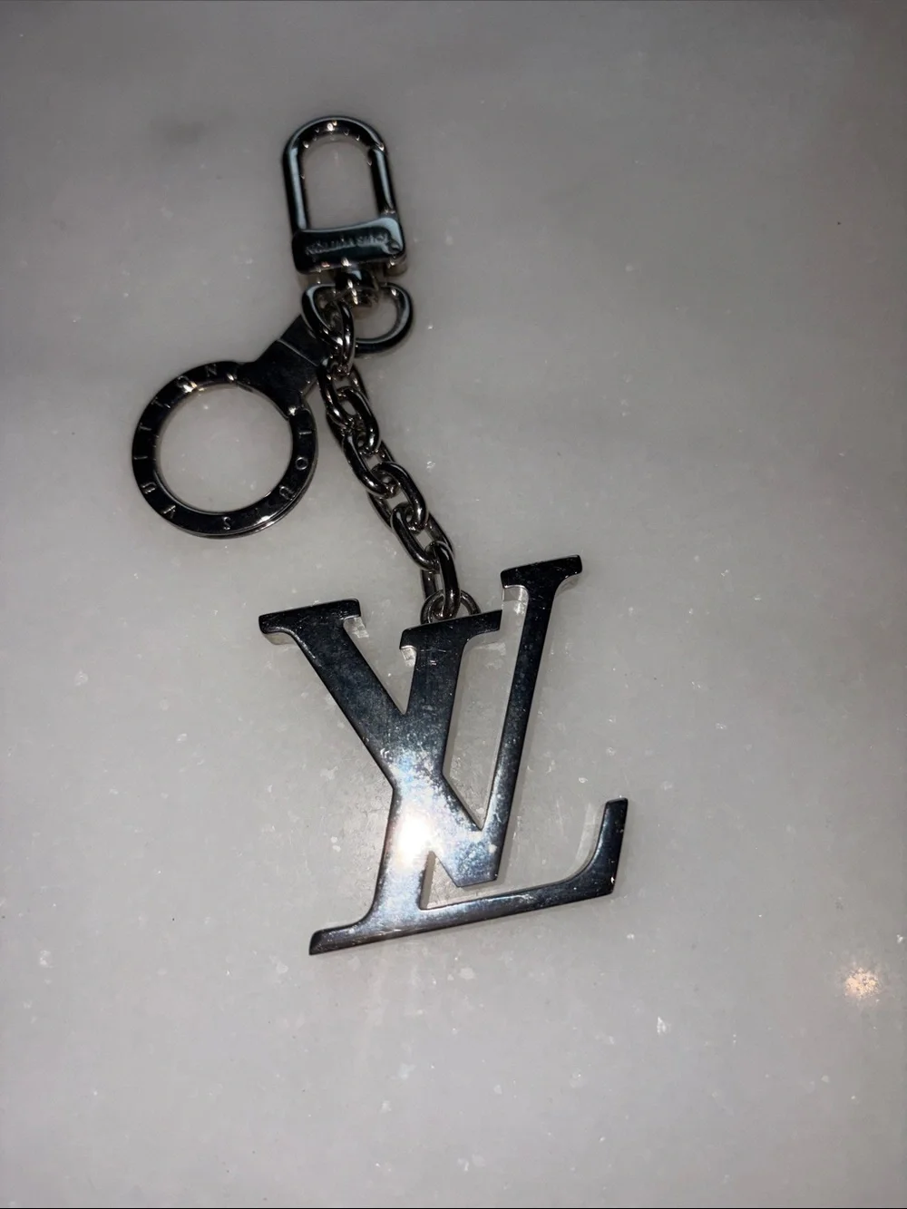 Louis Vuitton Silver LV Logo Keyring